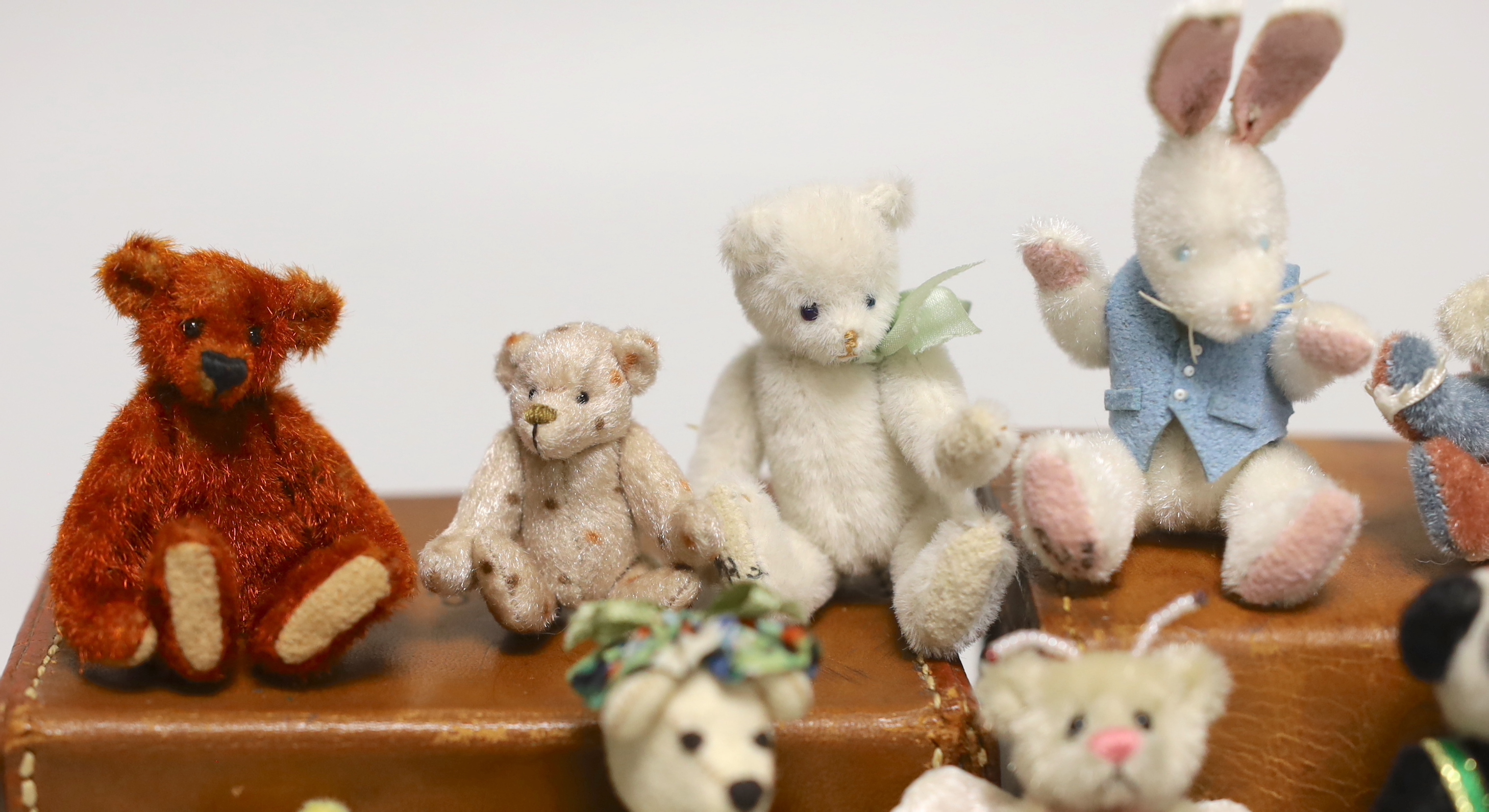 Twenty two miniature Artist bears, assorted teddy bear badges and three teddy bear brooches